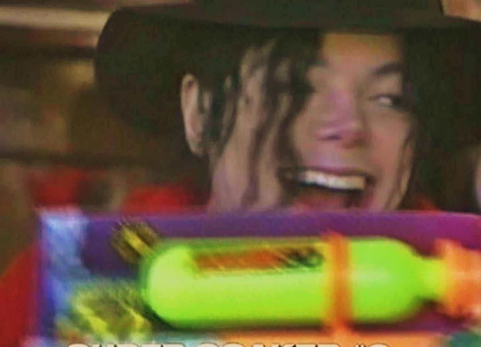 MJ-and-his-super-soaker-michael-jackson-16477643-1585-1146.jpg